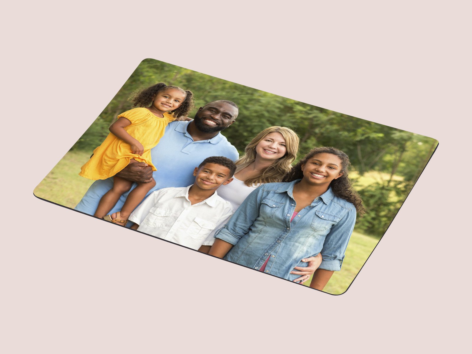 A 3x4 photo magnet with a family portrait