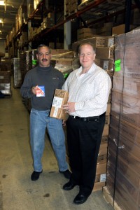CFO Jonathan Sweetwood (Left) and President Matthew Sweetwood (Right) with the last ever shipment of Polaroid film