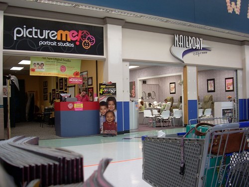 Sears and Walmart Close Photo Studios