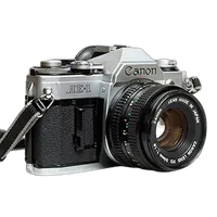 Used Canon AE-1 w/ 50mm 1.8 Chrome - Excellent 4