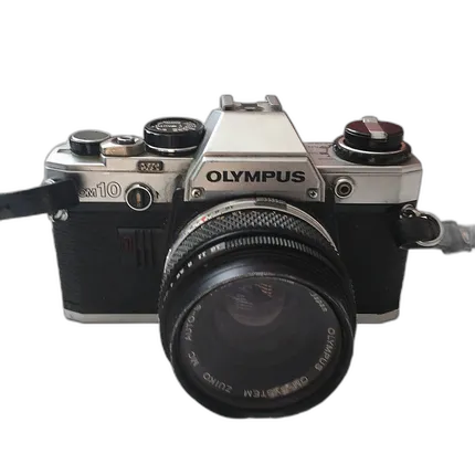 Used Olympus OM10 w/ 50mm 1.8 and FC Manual Adapter - Good