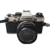 Used Olympus OM10 w/ 50mm 1.8  and  FC Manual Adapter - Good 0