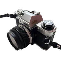 Used Olympus OM10 w/ 50mm 1.8  and  FC Manual Adapter - Good 1